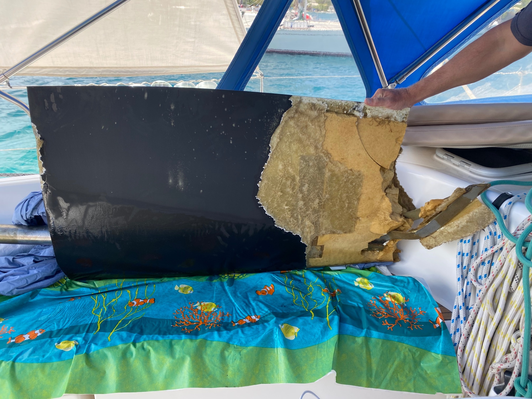 Yacht damage survey — delaminated GRP panel with core failure assessed by SVG Marine Surveys