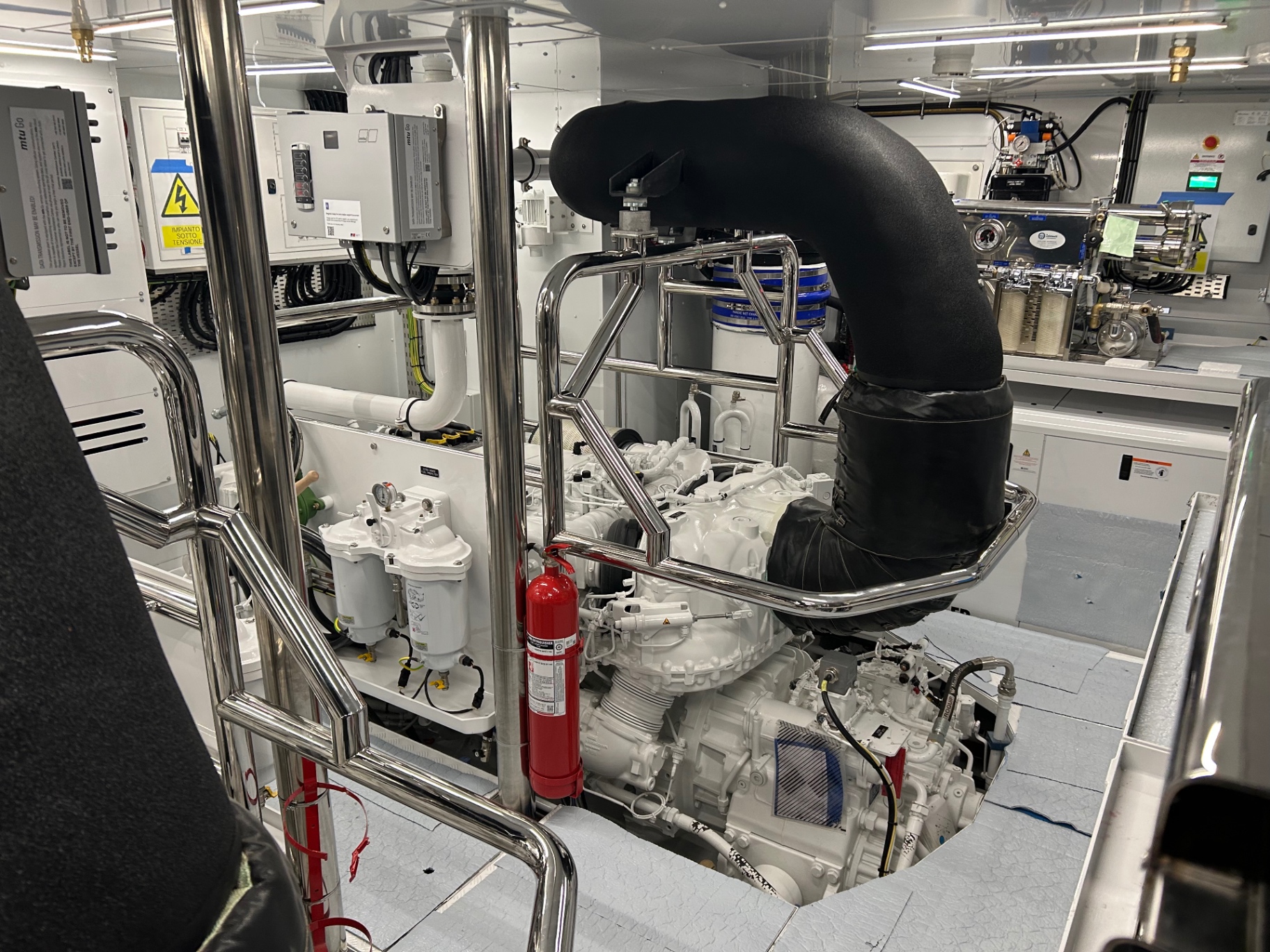 Yacht engine room survey — MTU main engine and fuel system inspection by a marine surveyor